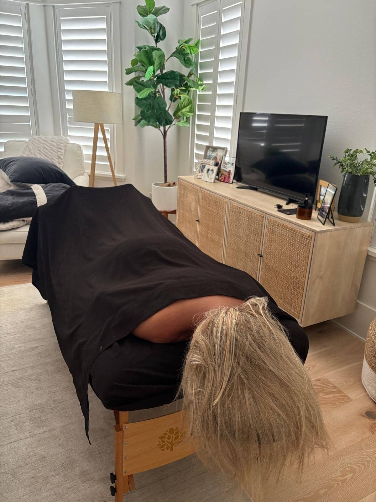 In-home massage session — relaxing environment